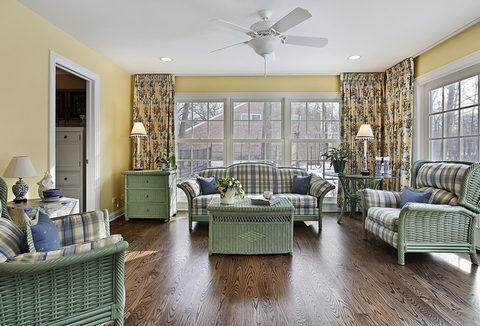 sun-room-with-green-wicker-furniture